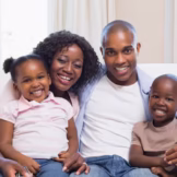 happy-family-smiling-camera-together_13339-113178