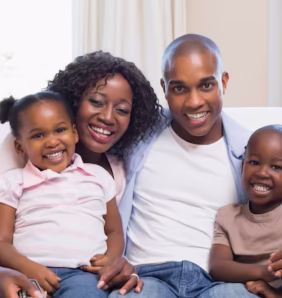 happy-family-smiling-camera-together_13339-113178